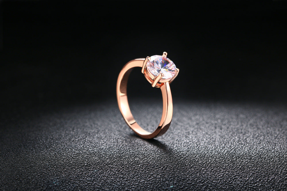 Rose gold and zircon ring